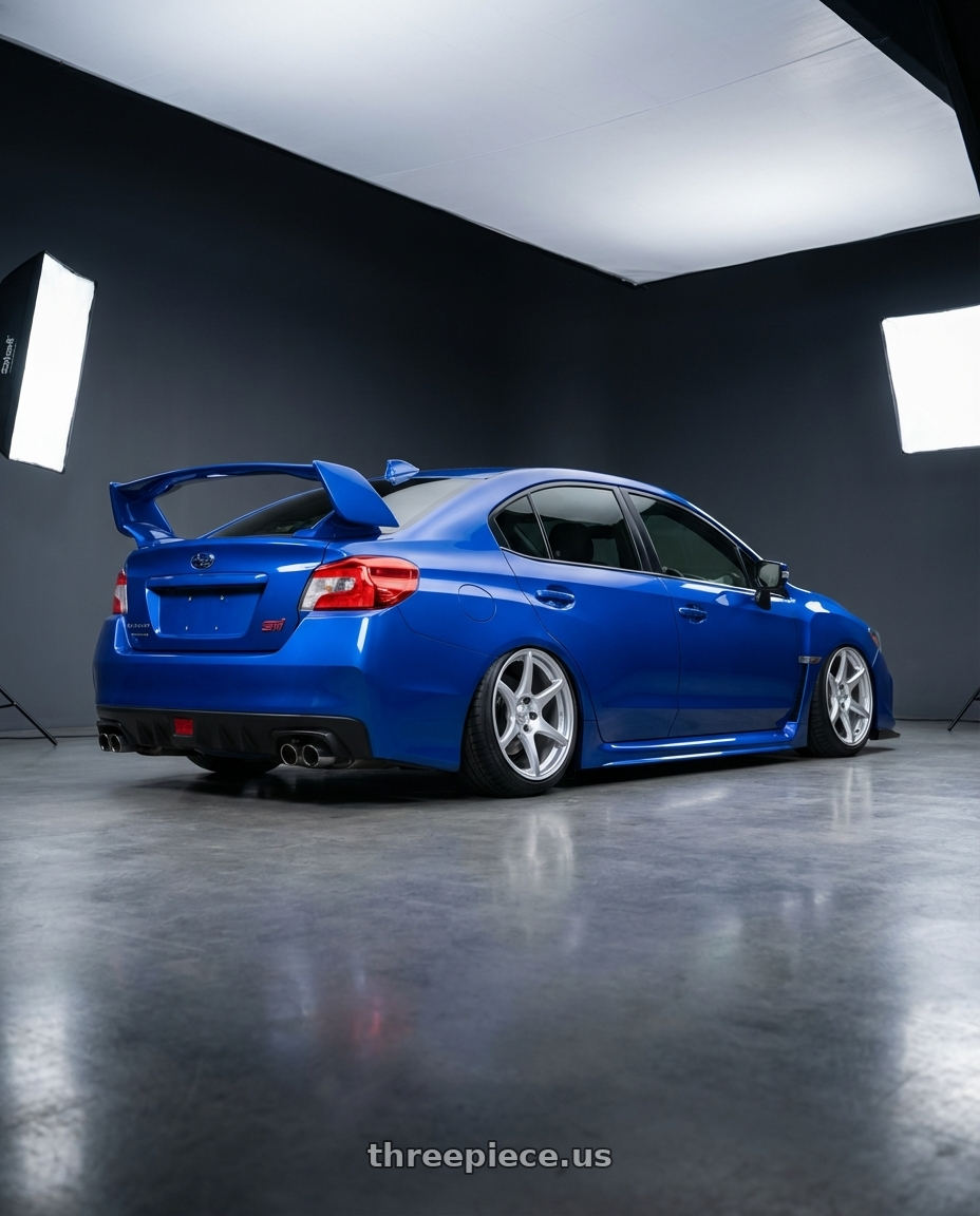 2018 Subaru WRX STI with Kansei K11S Tandem 5x114.3 18x9 12 Hyper Silver wheels rear three quarter view slight stretch tires