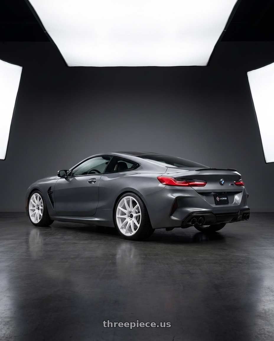 2023 BMW M8 with Vors TR4 5x112 20x9.5  +35 White wheels rear three quarter view square tires