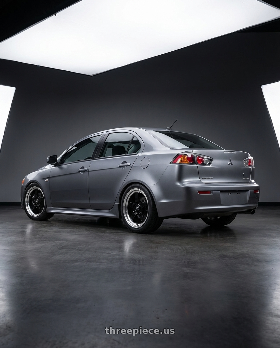 2014 Mitsubishi Lancer Ralliart with Forgestar D5 Drag 5x114.3 18x10 +22 Gloss Black Machined wheels rear three quarter view square tires