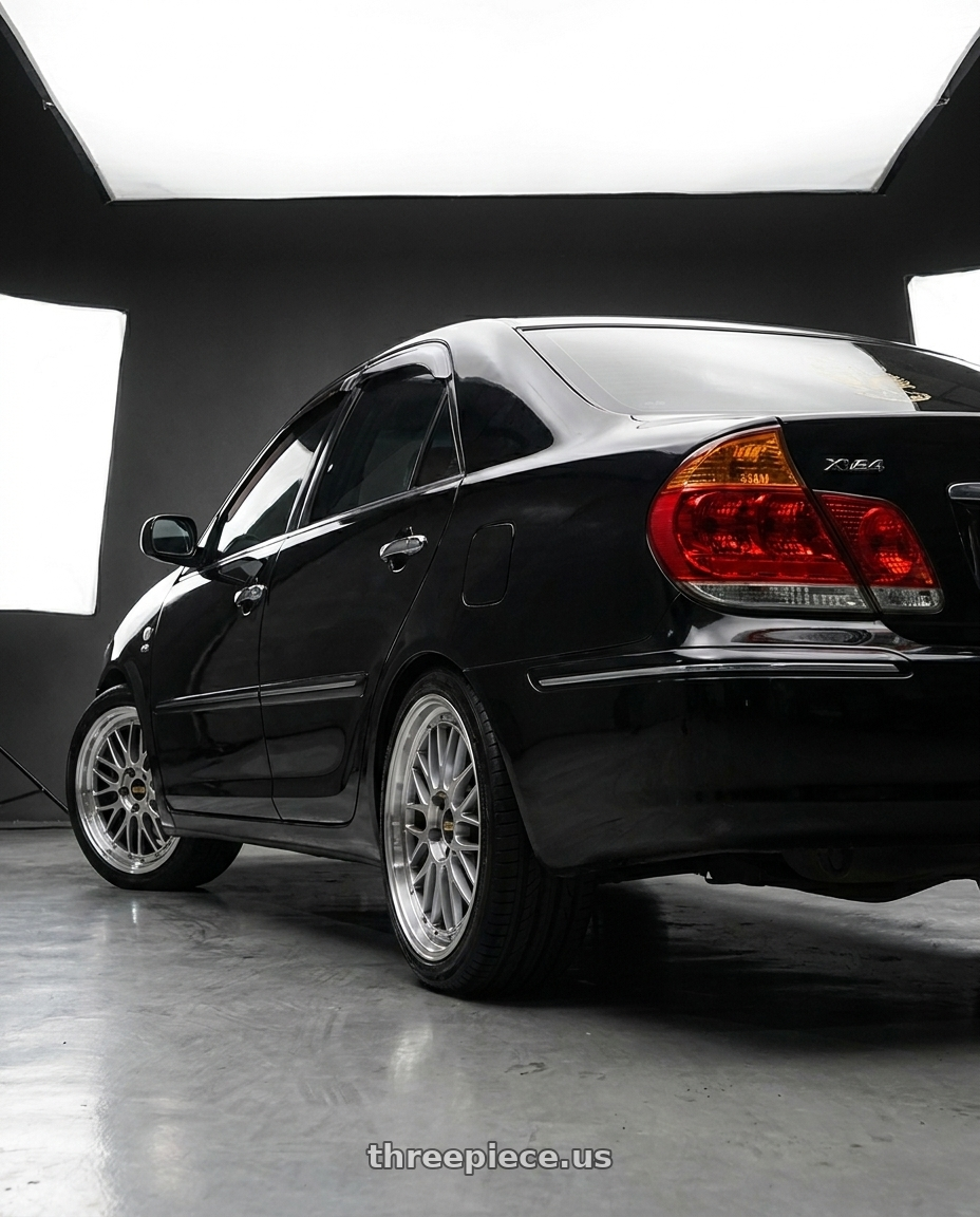 2005 Toyota Camry xv30 black  with BBS LM 5x114.3 19x9.0+38 Diamond Silver wheels rear three quarter view square tires