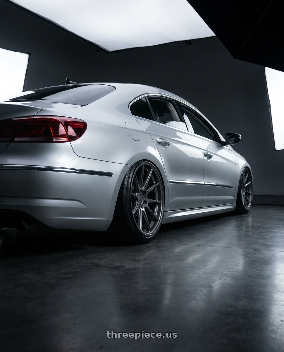 2015 Volkswagen CC with Aodhan AFF2 5x112 19x9.5+35 Matte Gray wheels rear three quarter view slight stretch tires