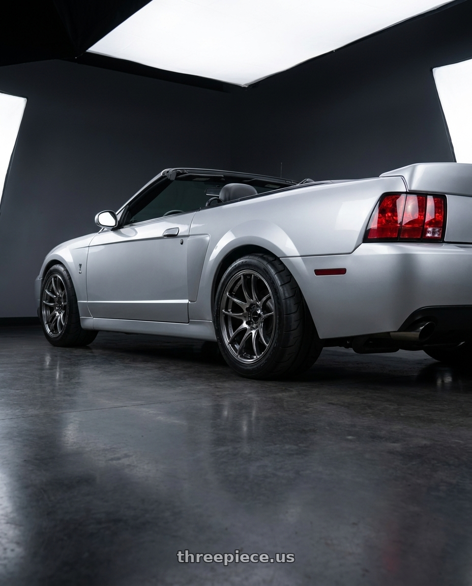 2004 ford mustang  with Vors TR4 5x114.3 18x9.5  +22 Hyper Black wheels rear three quarter view meaty tires