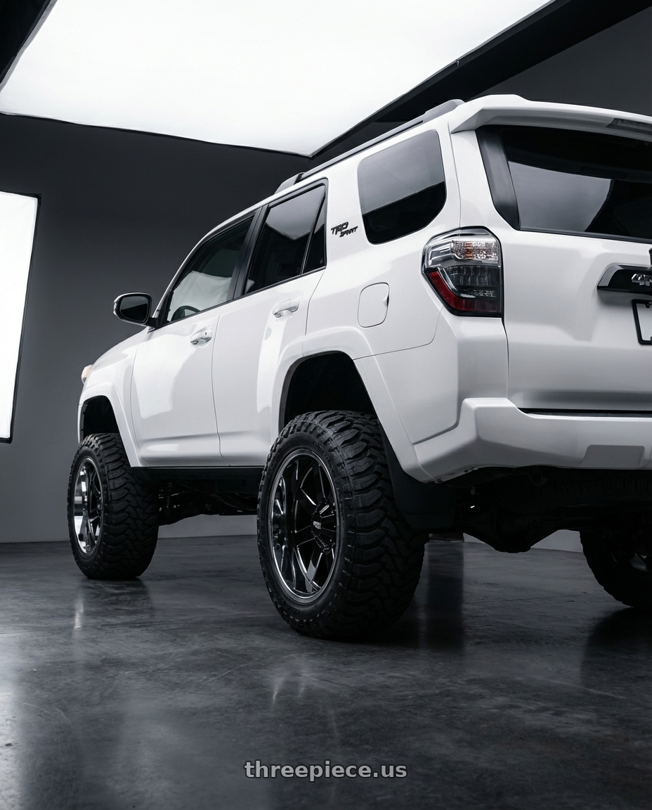 2022 Toyota 4Runner with Moto Metal MO200 6X139.7 20X12 -44 GLOSS BLACK MILLED CENTER CHROME LIP wheels rear three quarter view meaty tires