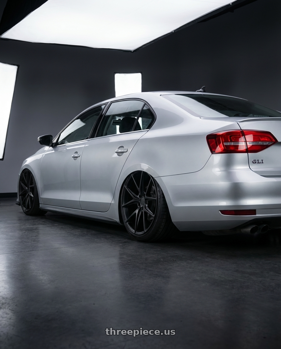 2016 Volkswagen Jetta GLI MK6 with Niche 1PC M117 MISANO 5X112 18X8 +42 MATTE BLACK wheels rear three quarter view slight stretch tires