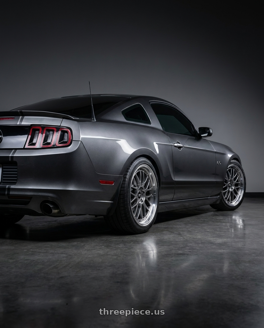 2014 Ford Mustang GT with MST Wheels LeMan 5x114.3 19x9.5 +35 Hyper Black w/Machined Lip wheels rear three quarter view square tires