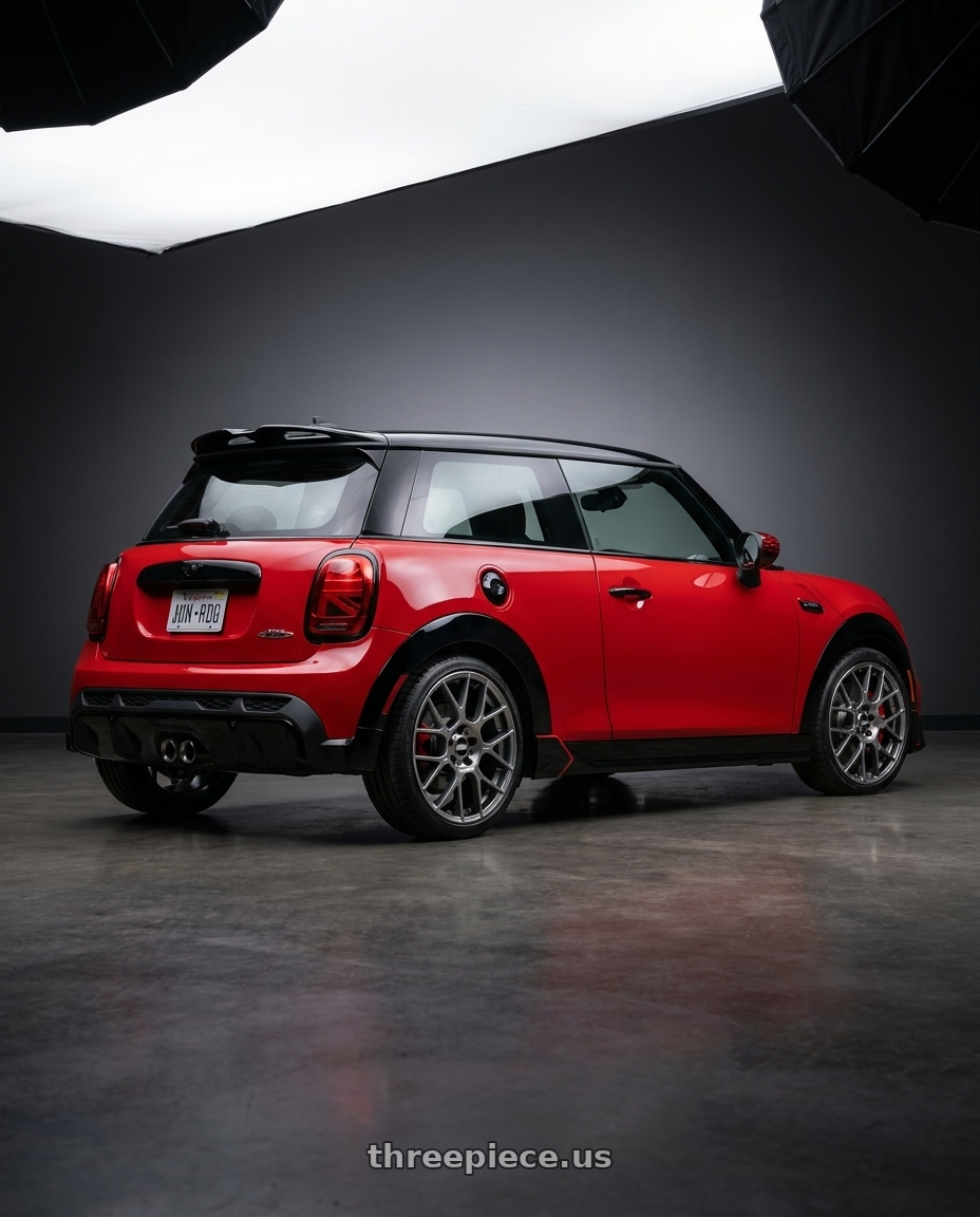 2025 mini jcw red with BBS XR 5x114.3 18x8.0+40 Gloss Platinum wheels rear three quarter view square tires