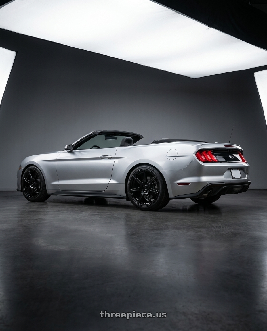 2018 ford mustang with Voxx Replica Mustang GT500 5x114.3 19x10+40 Gloss Black wheels rear three quarter view slight stretch tires