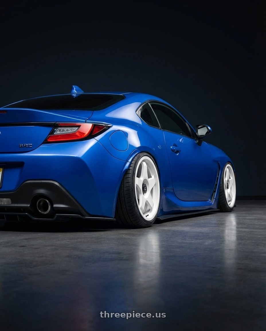 2024 Subaru BRZ with fifteen52 CHICANE 5x114.3 / 5x100 18x8.5 +35 RALLY WHITE (GLOSS WHITE) wheels rear three quarter view slight stretch tires