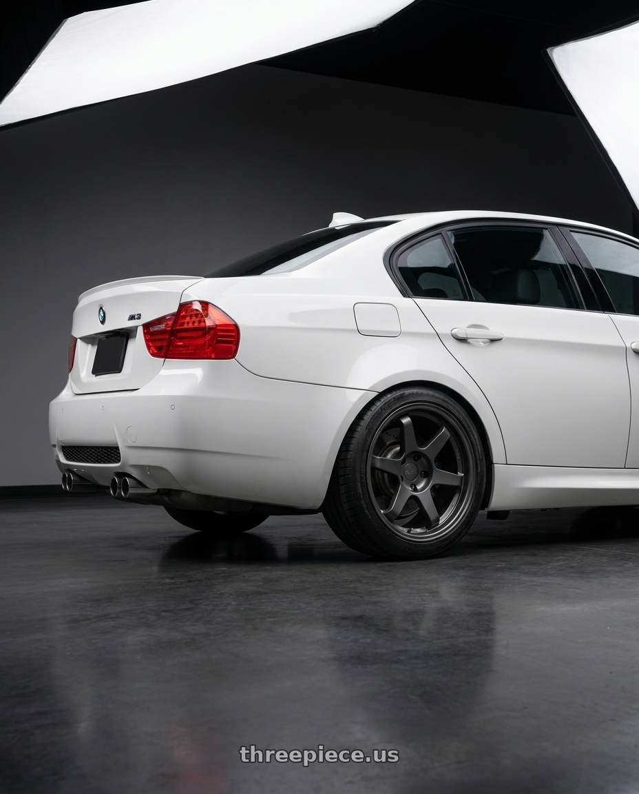 2009 E90 M3 with 9six9 SIX-1 5x120 18X10 +35 Carbon Gray wheels rear three quarter view square tires