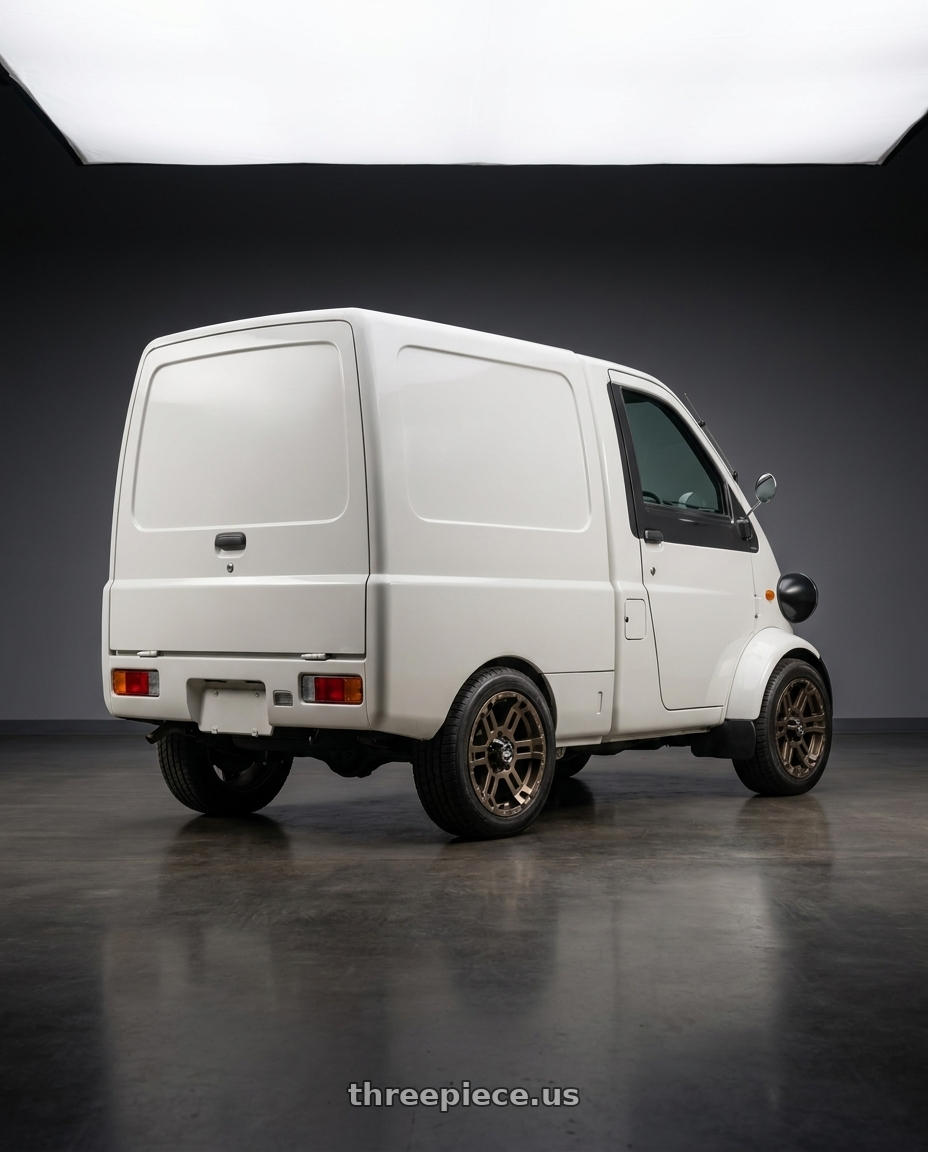 1998 Daihatsu Midget Ii Cargo with Enkei Commander 6x139.7 18x8.5-10 Bronze wheels rear three quarter view square tires