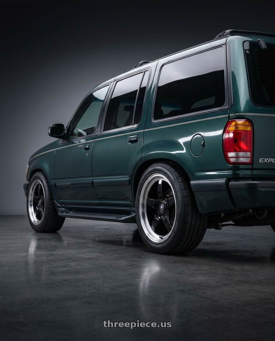 1998 Ford Explorer with Forgestar D5 Drag 5x114.3 18x9 +22 Gloss Black Machined wheels rear three quarter view square tires