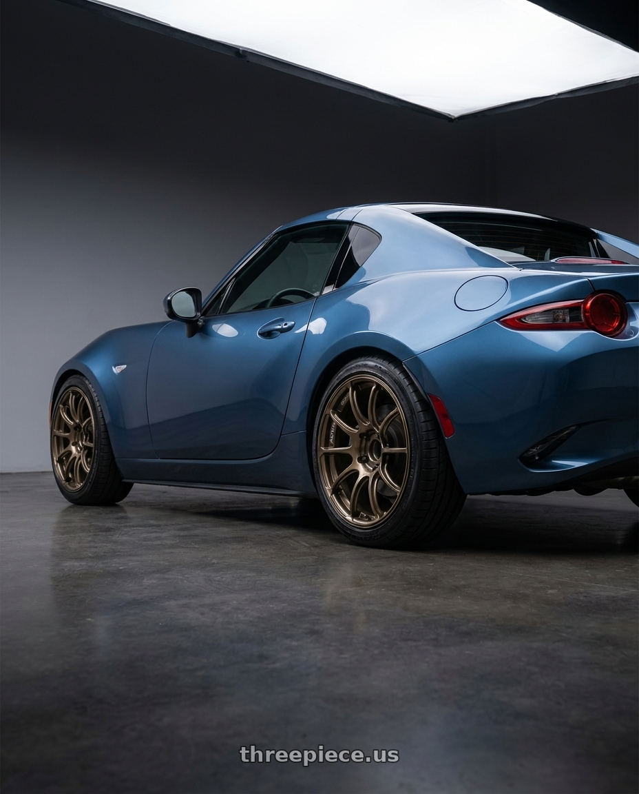 2019 mazda mx5 eternal blue with Advan Racing RZII 4x100 17x7.5 +38 RACING BRONZE wheels rear three quarter view square tires