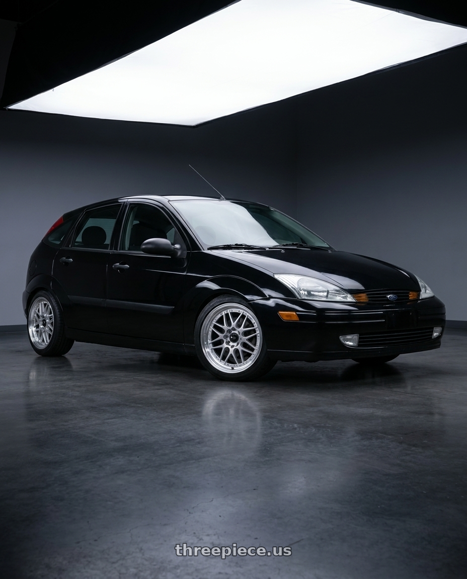 2004 Ford Focus ZTS with Vors VR7 4x108 16x7  +38 Silver Machine Face Lip Chrome Rivet wheels front three quarter view lowered stance