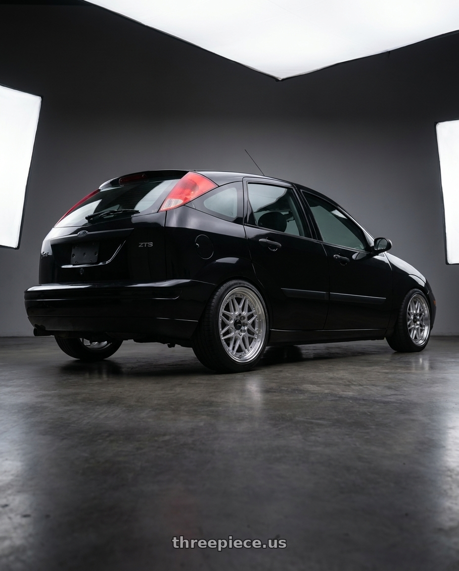 2004 Ford Focus ZTS with Vors VR7 4x108 16x7  +38 Silver Machine Face Lip Chrome Rivet wheels rear three quarter view square tires