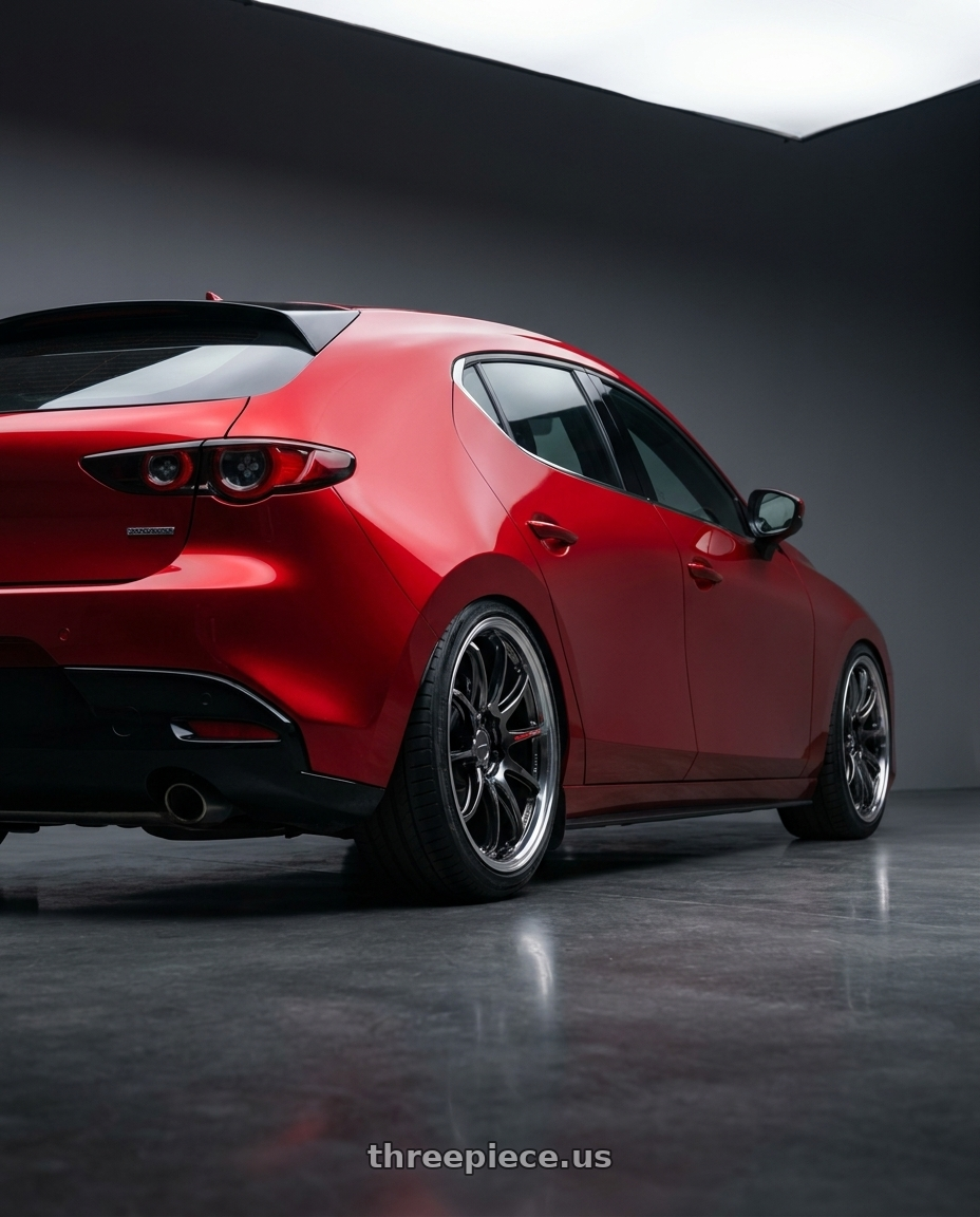 2024 Mazda 3 with Work Emotion Zr10 5x100 18x8.5 +38 Glim Black Diamond Rim cut wheels rear three quarter view slight stretch tires