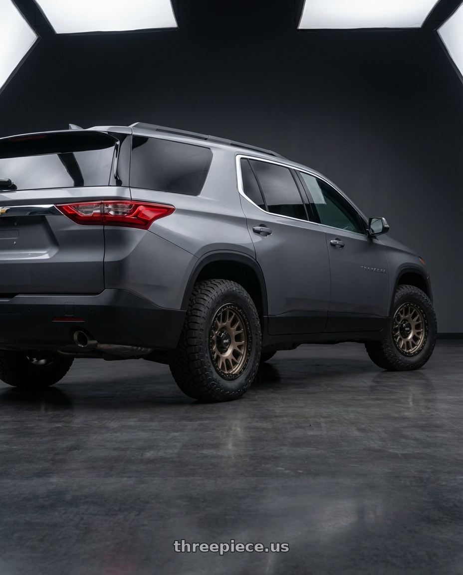 2020 Chevrolet traverse with MVX OFFROAD VX12 5X150 18x9 +18 Matte Bronze wheels rear three quarter view meaty tires