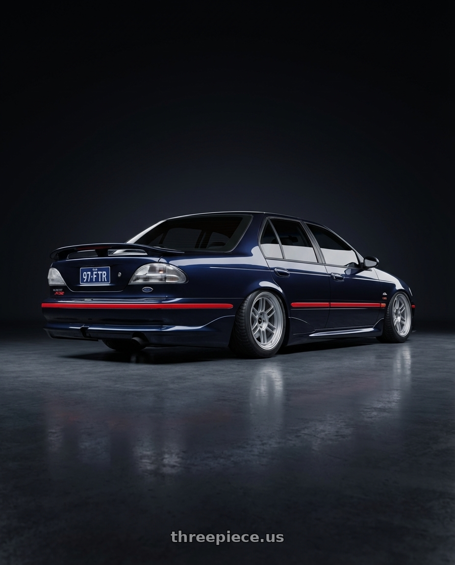 1997 ford falcon with Enkei RPF1 5x114.3 17x7+45 Silver wheels rear three quarter view meaty tires