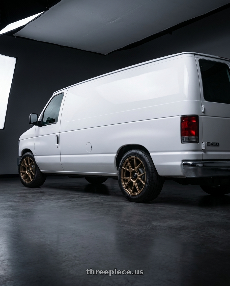 2010 Ford E 450 with Konig Ampliform 5x100 18x8.5+44 Gloss Bronze wheels rear three quarter view square tires