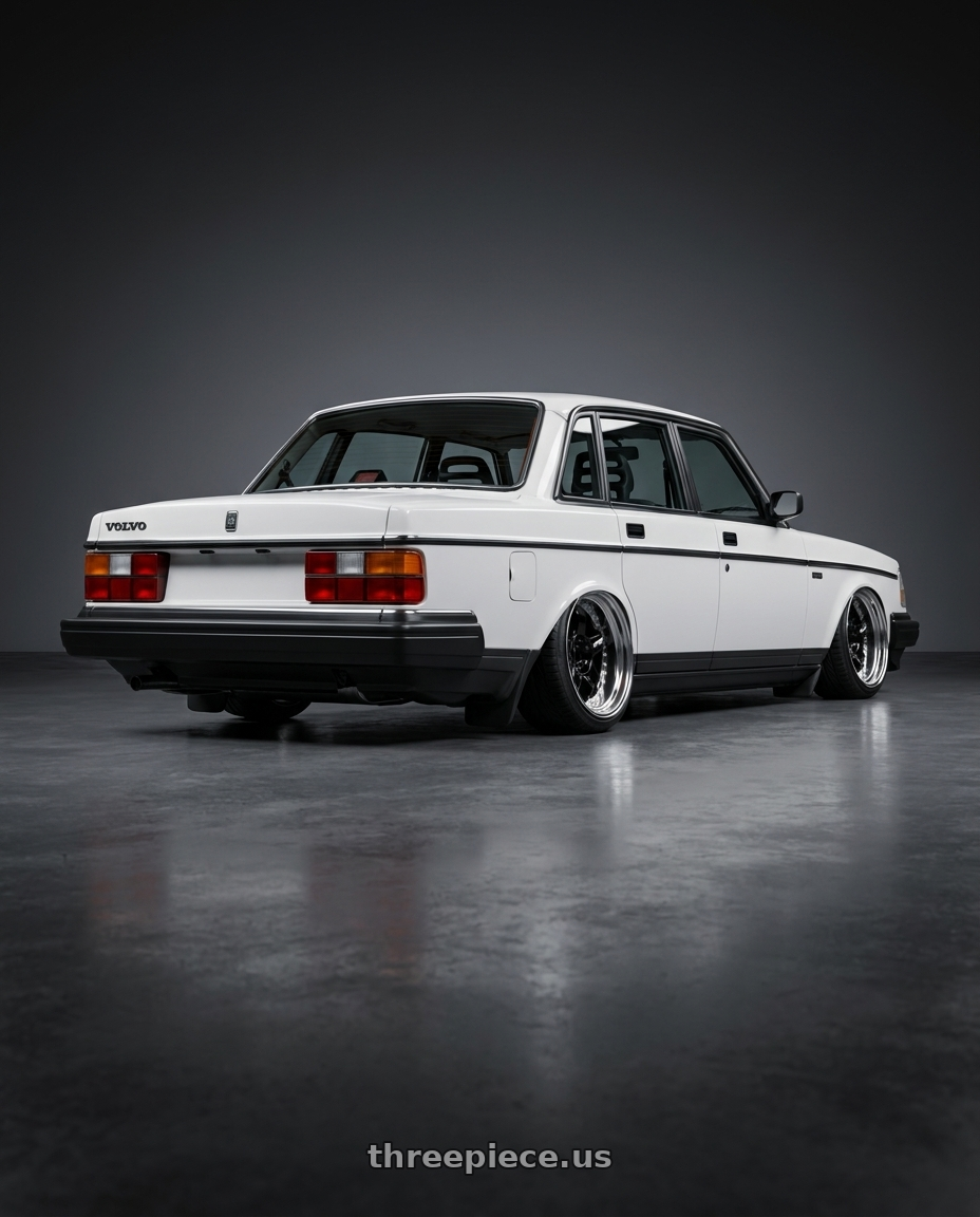 1993 Volvo 240 with Work Meister S1 3P 4x100 17x11+3 A Disk Black wheels rear three quarter view extreme stretch tires