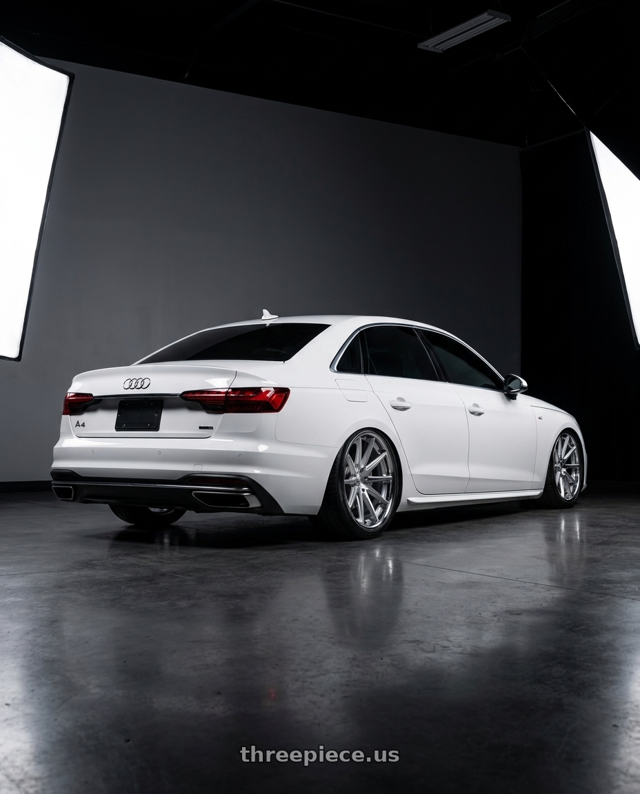 2022 Audi A4 with Rohana RFC10 5x112 20x10+22 Machine Silver/Chrome Lip wheels rear three quarter view slight stretch tires