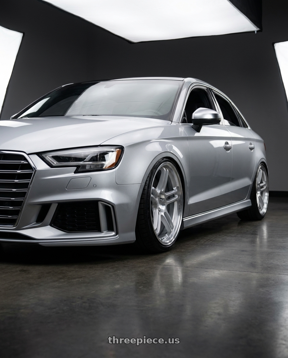 2016 Audi S3 with Rotiform RPS 5x112 19x10.5 +35 Matte Silver W/ Diamond Cut Li wheels front three quarter view lowered stance