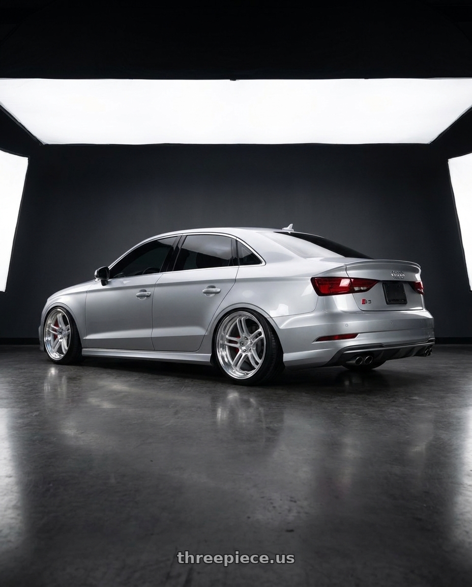 2016 Audi S3 with Rotiform RPS 5x112 19x10.5 +35 Matte Silver W/ Diamond Cut Li wheels rear three quarter view extreme stretch tires