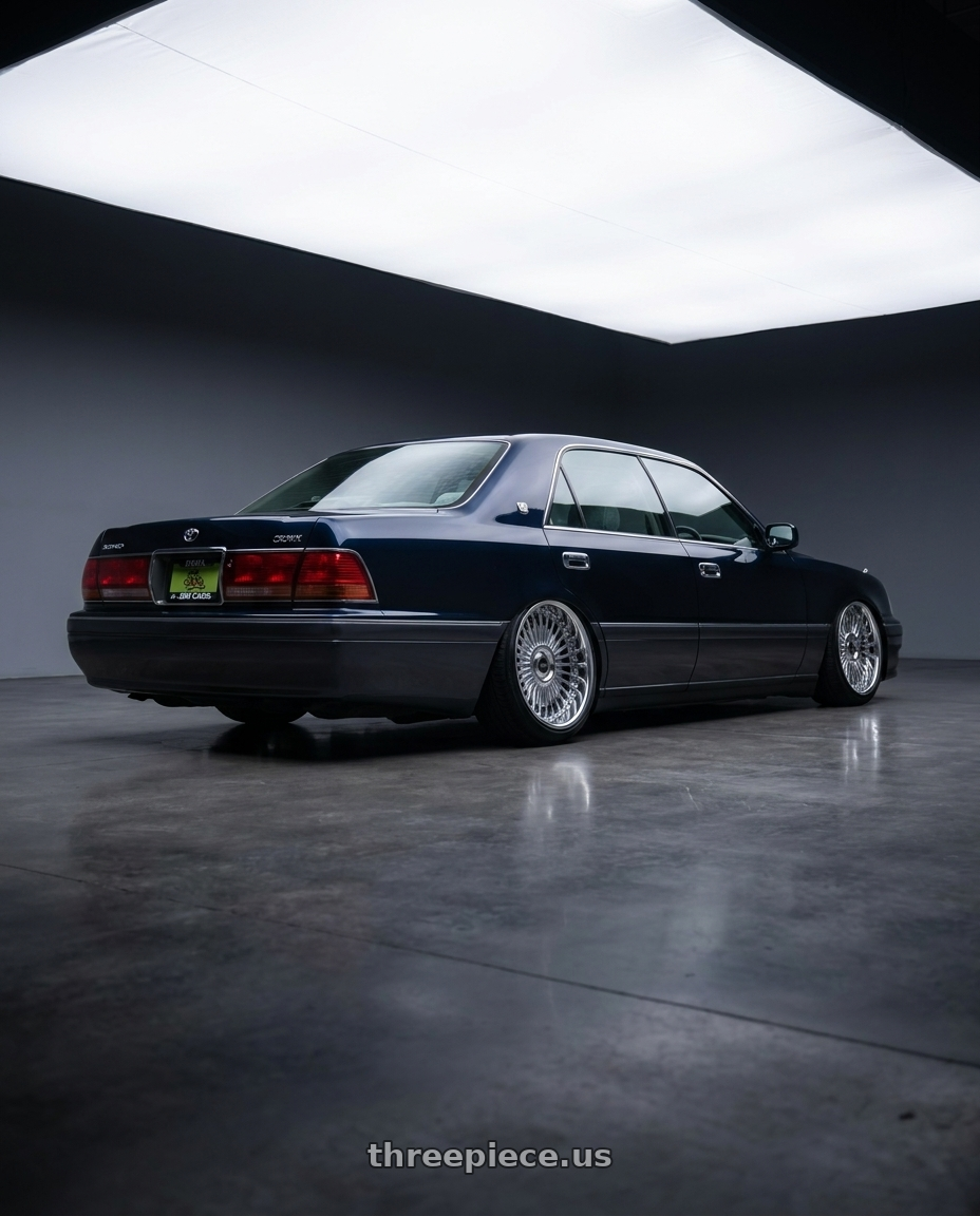 1998 Toyota crown with Work Emitz Chrome 5x114.3 19x10.5 +0 wheels rear three quarter view slight stretch tires