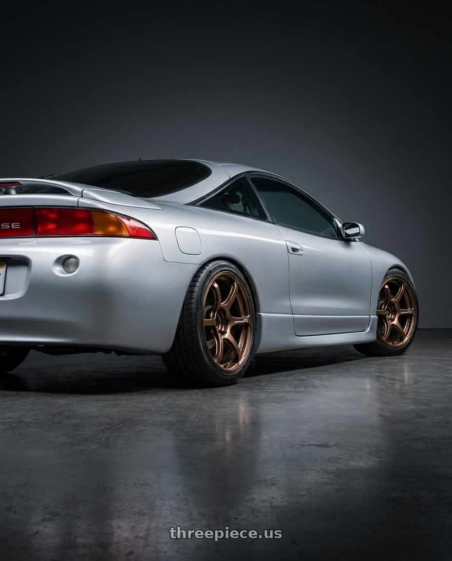 Mitsubishi Eclipse 1998 with Advan Racing RG-4 4x100 17x7.5 +38 RACING COPPER BRONZE wheels rear three quarter view square tires