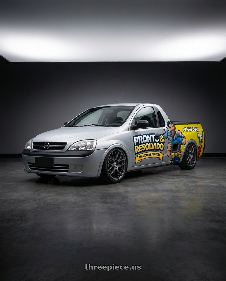 montana conquest 2010 adesivada  with TSW NURBURGRING 5X114.3 17X7.5 +45 MATTE GUNMETAL wheels front three quarter view slammed stance