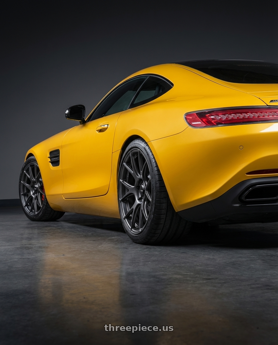 2019 Mercedes-Benz AMG GT with Konig Ampliform 5x112 19x8.5+32 Dark Metallic Graphite wheels rear three quarter view square tires