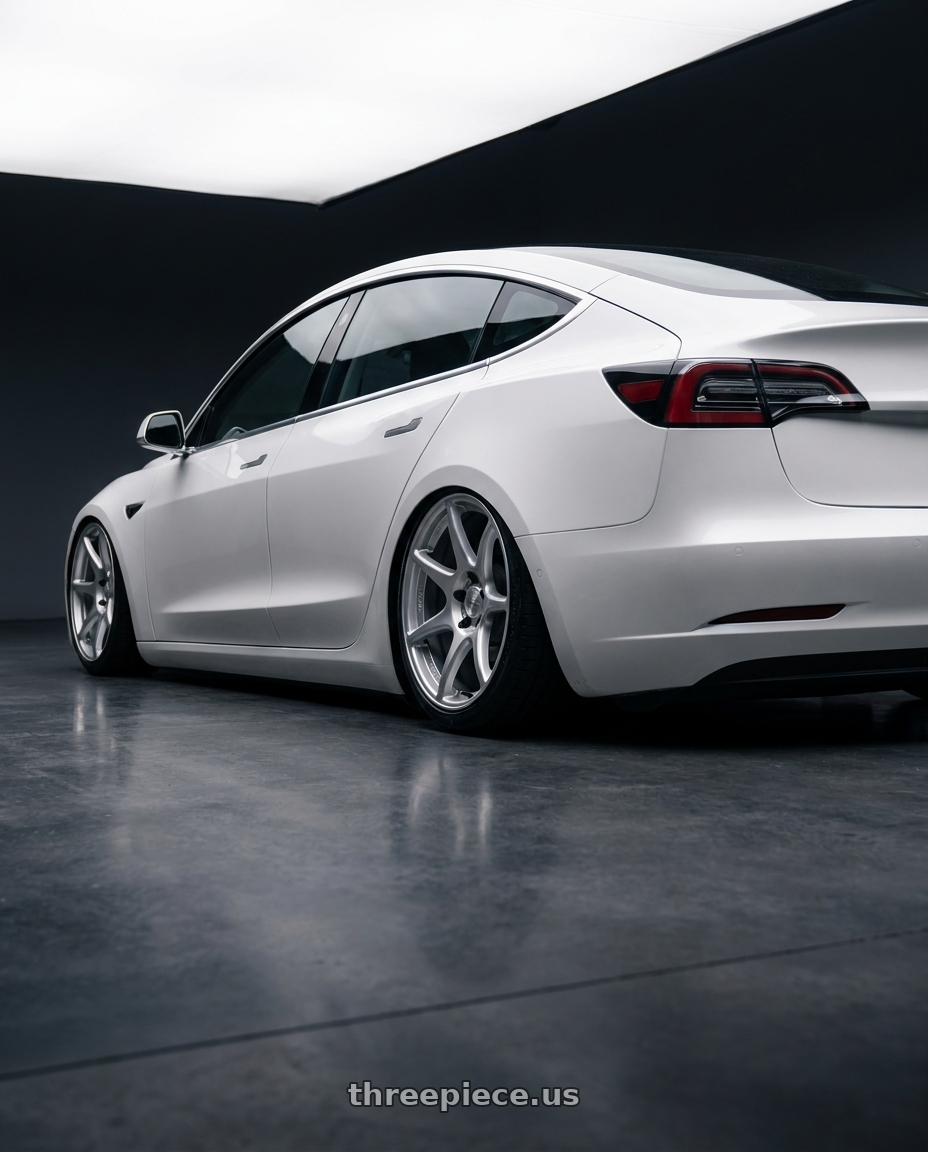 2023 Tesla Model 3 with Kansei K11S Tandem 5x114.3 19x9.5 12 Hyper Silver wheels rear three quarter view slight stretch tires