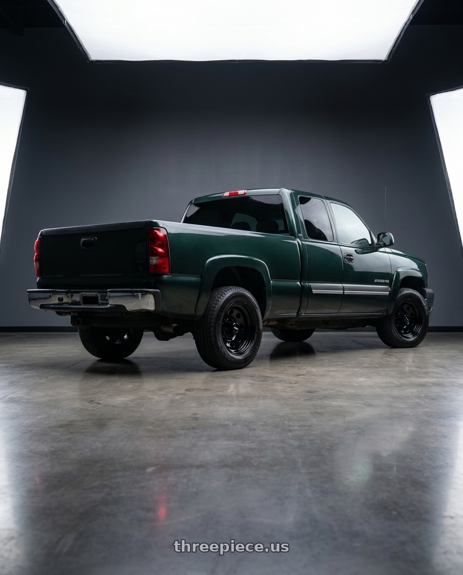 2003 Chevrolet Silverado 2500 HD with Vision HD 85H 6x139.7 17x8-12 Gloss Black wheels rear three quarter view slight stretch tires