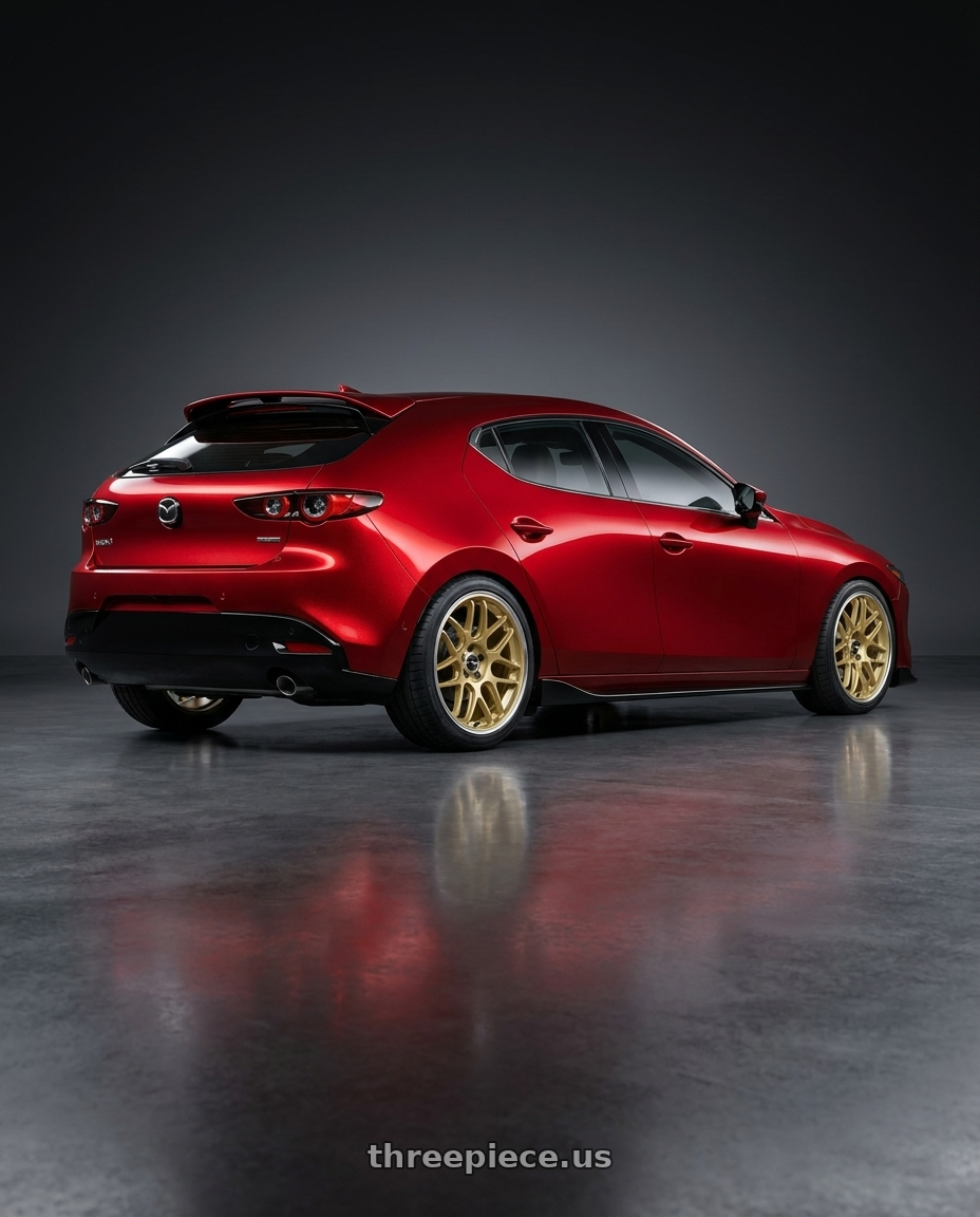 2026 Mazda 3 hatchback soul red with appearance package  with Motegi MR158 TSUBAKI 5X114.3 18x8.5 +35 MOTORSPORT GOLD W/ MACHINED LIP wheels rear three quarter view square tires