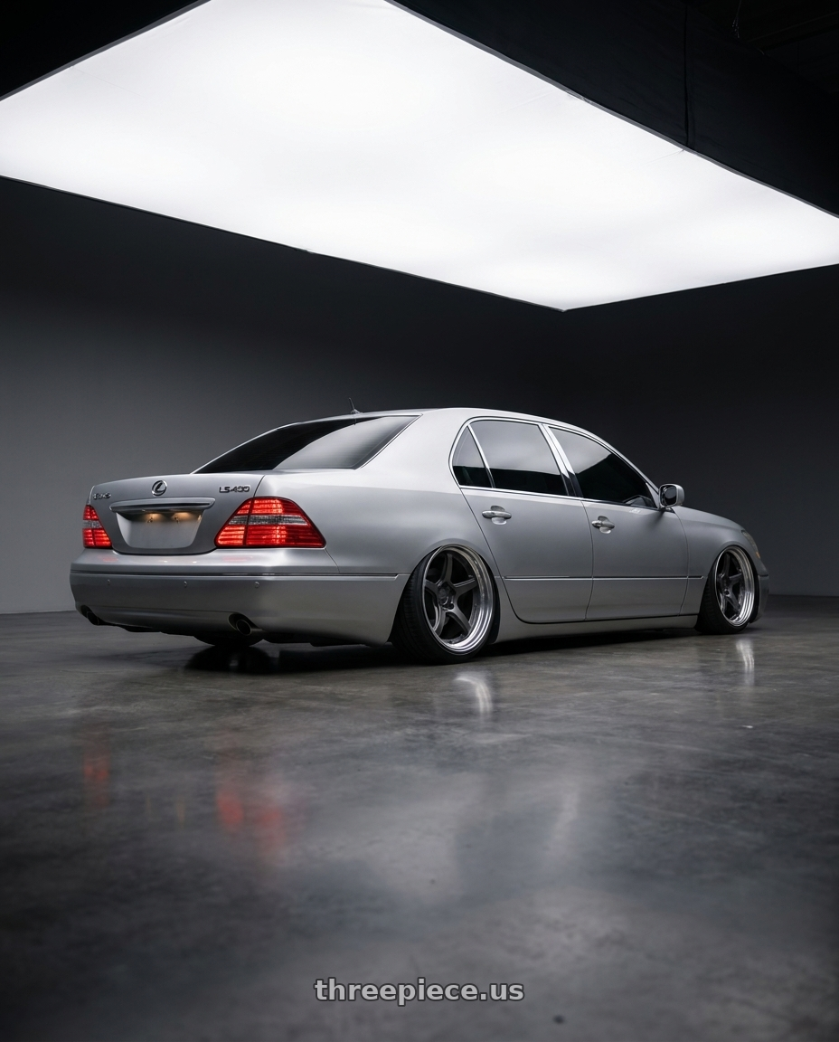 2004 lexus ls430 with Work Emotion T5r 5x114.3 19x9.5 +35 Matte Graphite wheels rear three quarter view extreme stretch tires