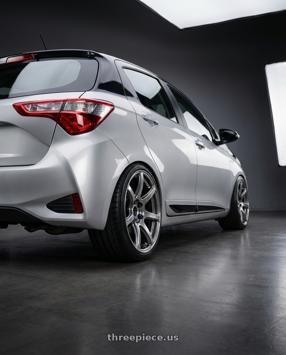2020 Toyota Yaris Y20 with Work Emotion T7r 5x100 18x10.5 +12 Gt Silver wheels rear three quarter view square tires
