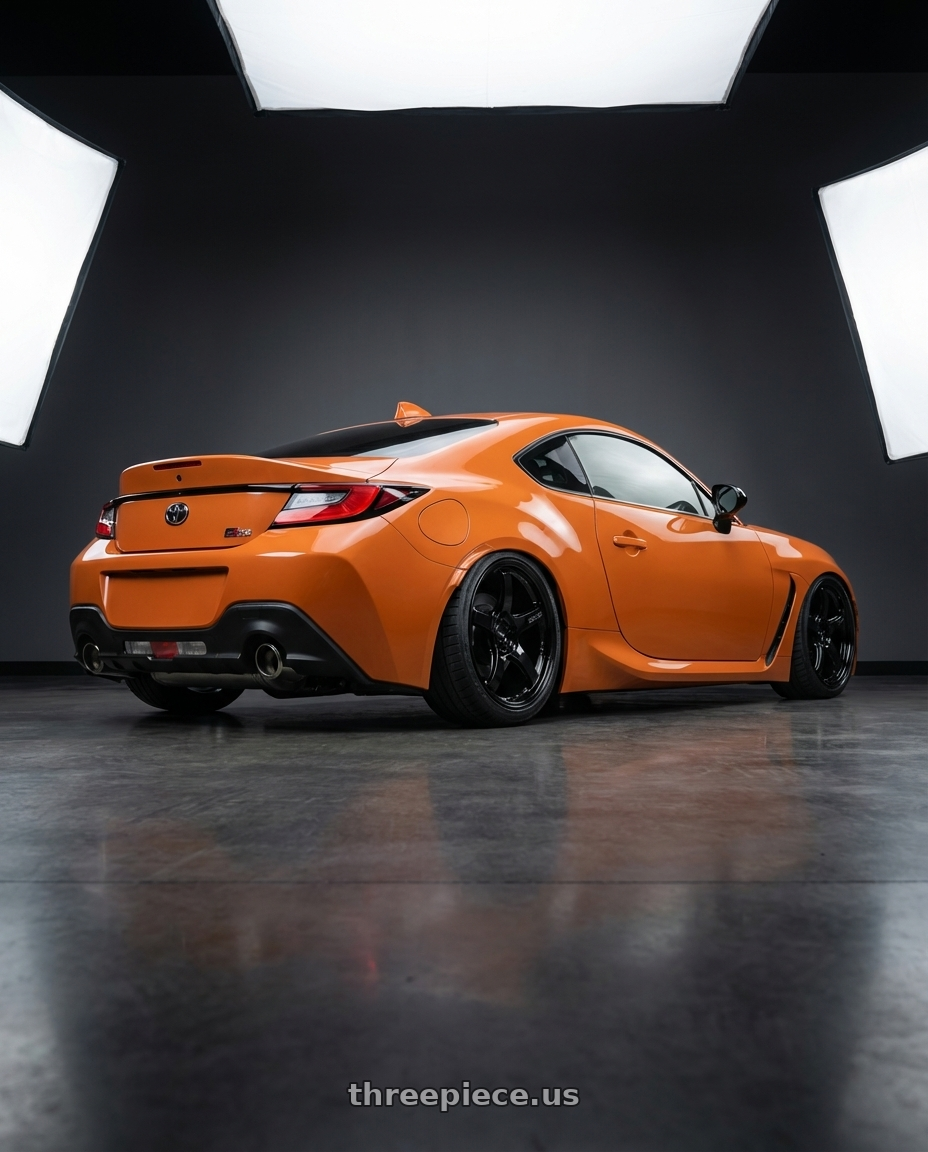 2023 gr86 10th anniversary  with Gram Lights 57CR 4x100 17x7 +40 Gloss Black wheels rear three quarter view slight stretch tires