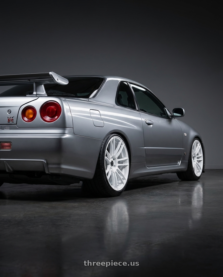2004 Nissan skyline R34 GT-R with Stage Wheels Belmont 5x114.3 18x9.5 +38 White wheels rear three quarter view slight stretch tires
