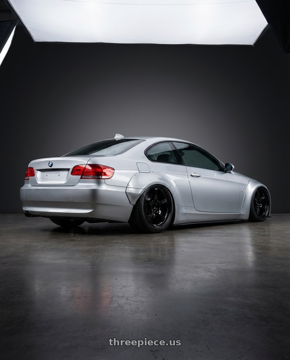 2012 BMW 3 Series E92 with Gram Lights 57CR 5x120 19x9.5+35 Glossy Black wheels rear three quarter view slight stretch tires