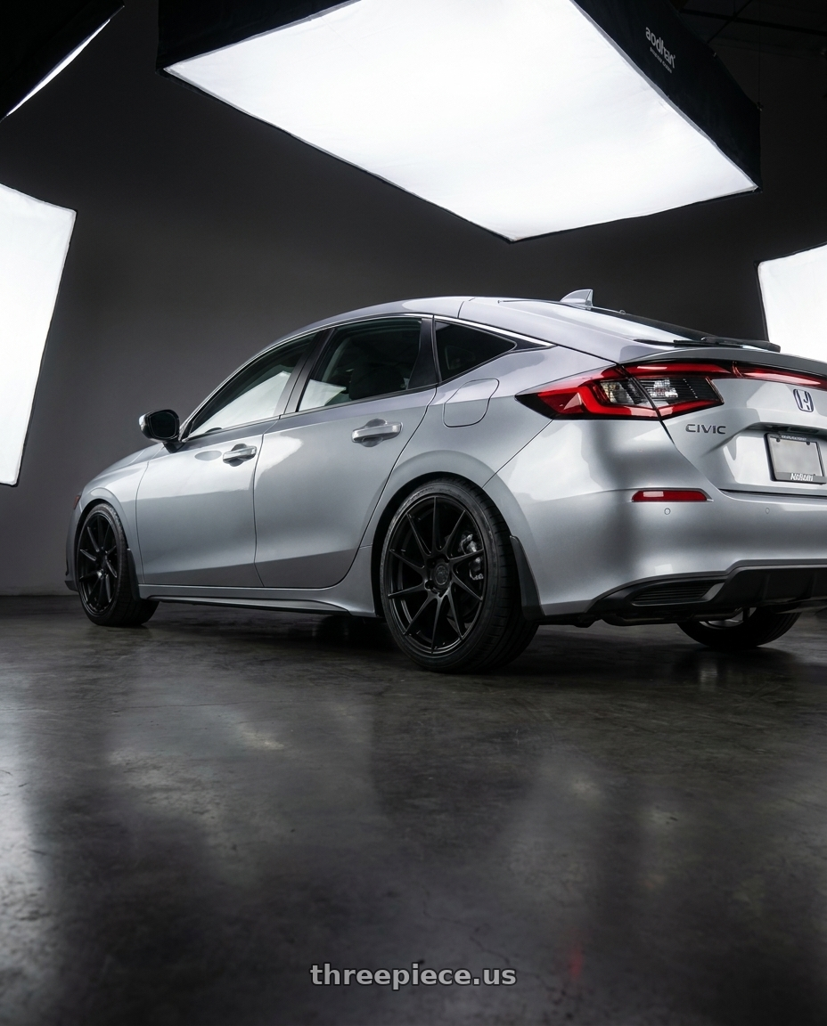 2023 Honda Civic Hatchback with Aodhan AH09 5x114.3 18x8.5 +35 Matte Black wheels rear three quarter view square tires
