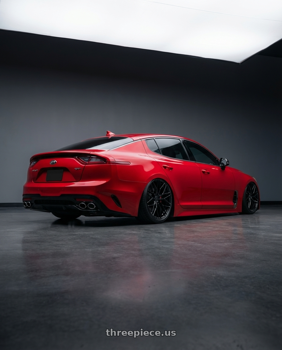 2022 Kia Stinger GT with Avant Garde Wheels M520R 5X114.3 19x8.5 +35 Gloss Black wheels rear three quarter view slight stretch tires