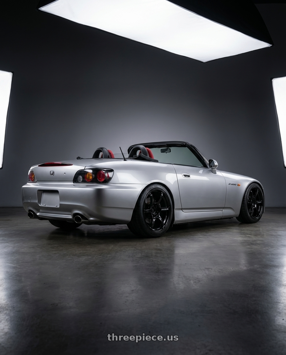 2009 Honda S2000 with Advan RGIII 5x114.3 17x8.0+45 Gloss Black wheels rear three quarter view square tires