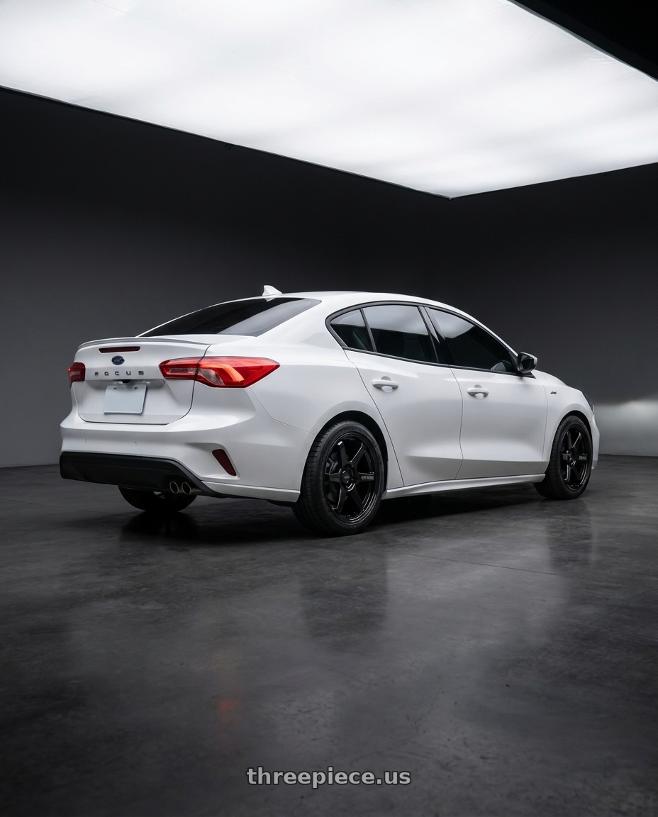 2020 focus st line with Enkei T6R 5x114.3 18x9.5+38 Gloss Black wheels rear three quarter view square tires