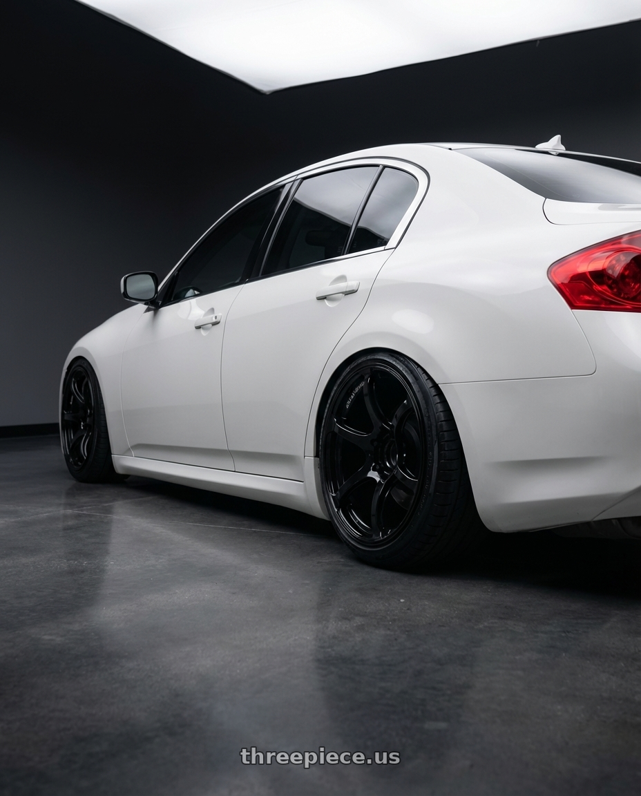 2012 Infiniti G37 with Advan RGIII 5x114.3 19x9.0+35 Gloss Black wheels rear three quarter view slight stretch tires
