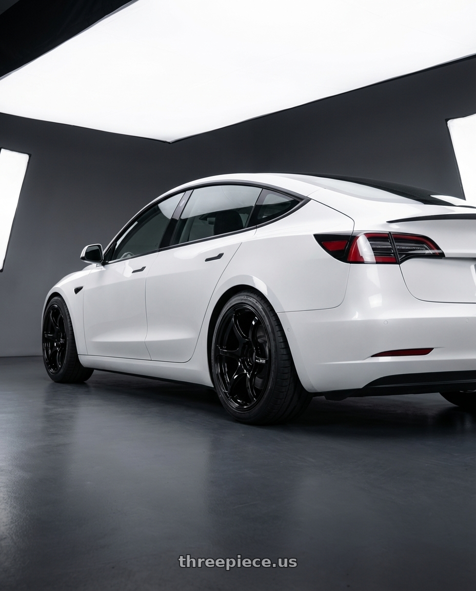2023 Tesla Model 3 with Advan RGIII 5x114.3 19x8.5+38 Gloss Black wheels rear three quarter view square tires