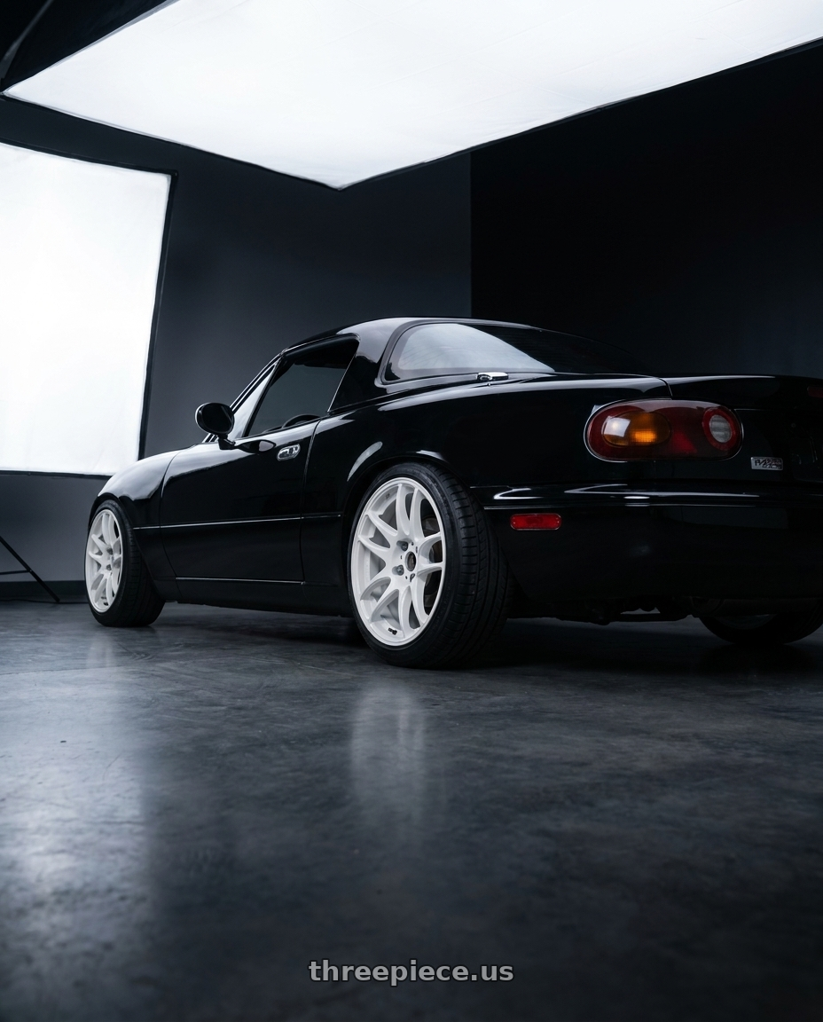 1994 mazda miata with Work Emotion CR Kiwami wheels rear three quarter view slight stretch tires