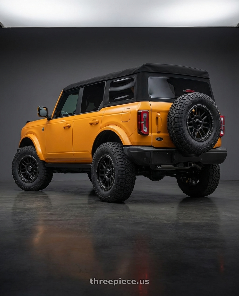 2024 Ford Bronco with Vision Off-Road 111 Nemesis 6x139.7 17x9-12 Matte Black wheels rear three quarter view meaty tires