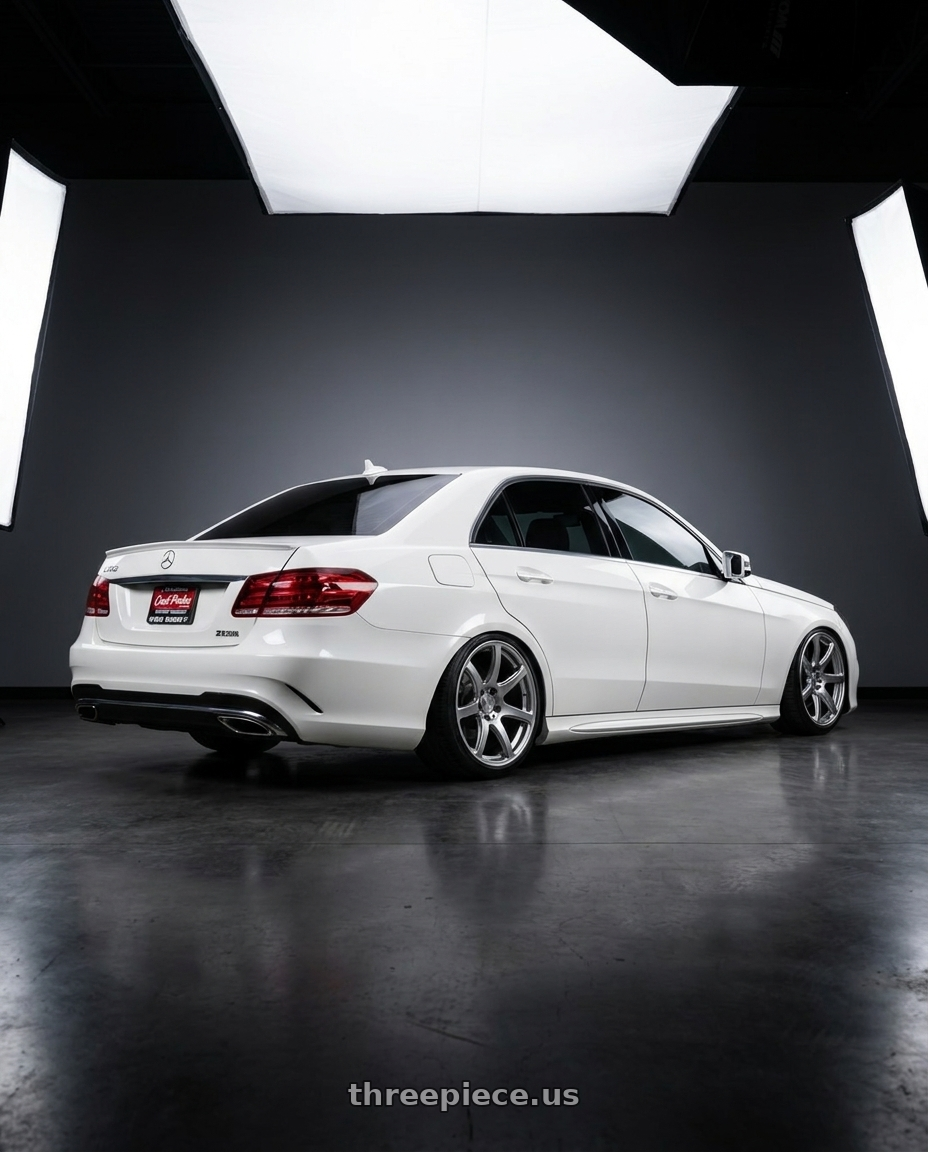 2014 Mercedes Benz e350 white with Work Emotion T7r 5x112 18x9.5 +30 Gt Silver wheels rear three quarter view slight stretch tires