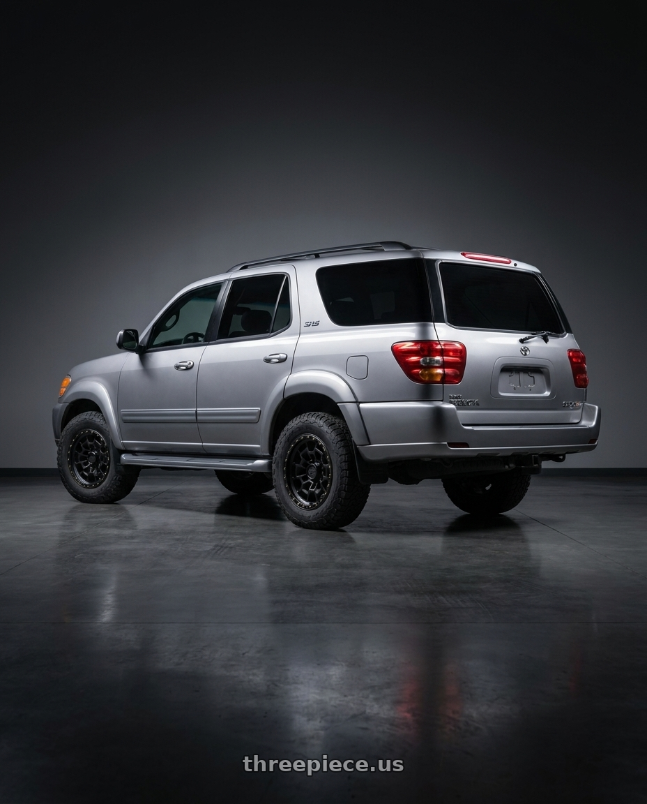 2002 Toyota Sequoia with KMC KM718 SUMMIT 6X139.7 17X8.5 +0 SATIN BLACK wheels rear three quarter view square tires