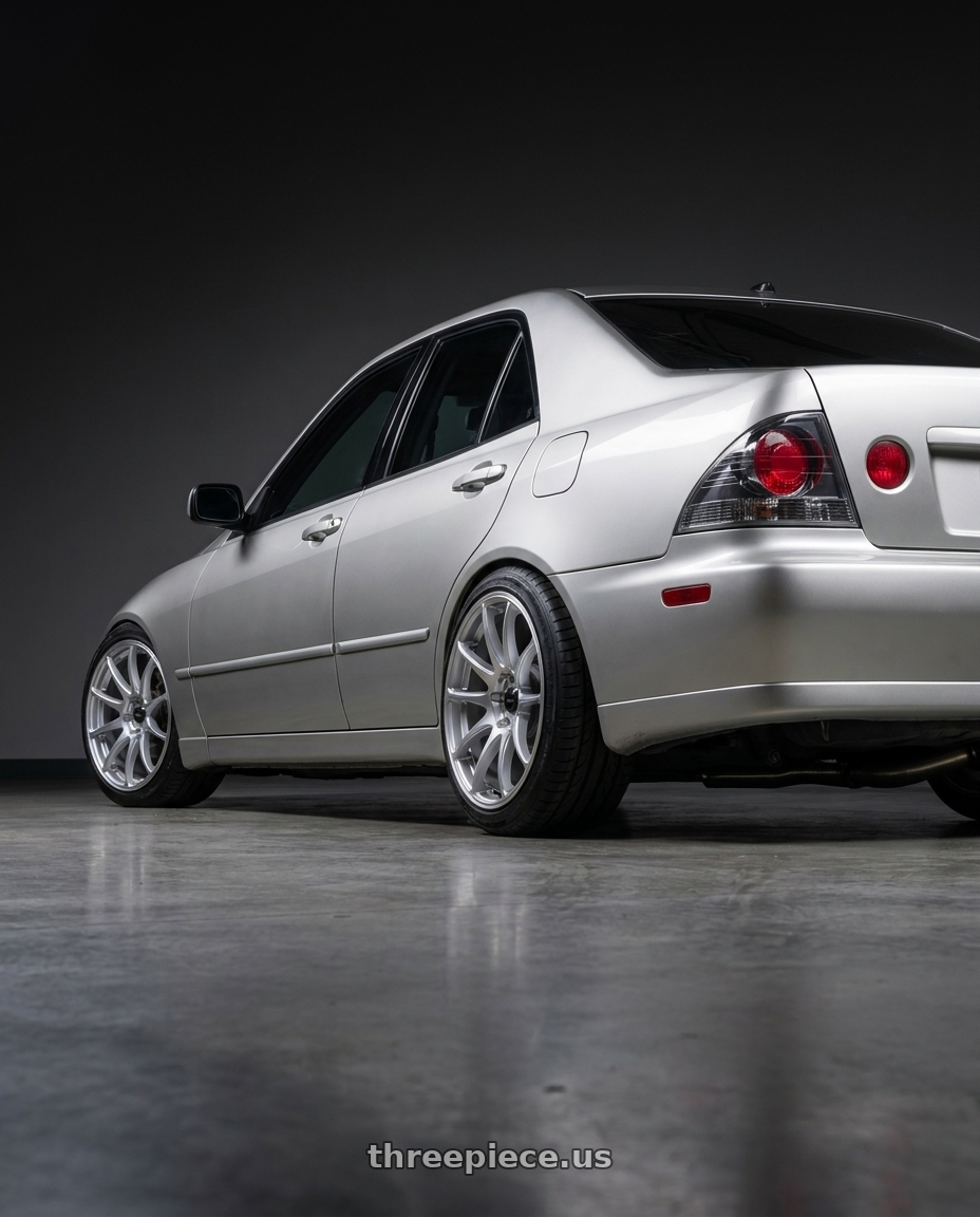 2001 Lexus is300 with Vors TR4 5x114.3 17x8  +35 Silver Machine Face wheels rear three quarter view slight stretch tires