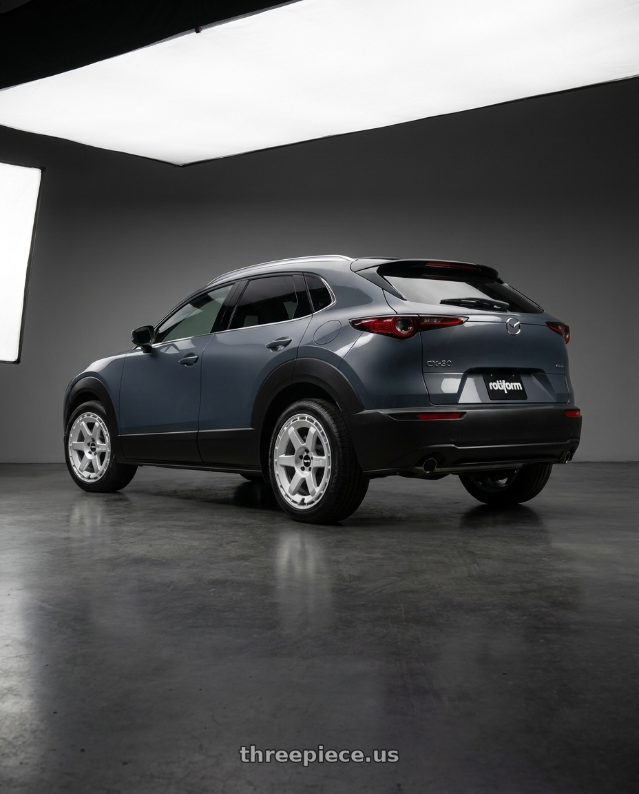 2026 mazda cx30 with Rotiform 1PC R184 KB1 5X120 19X8.5 +35 GLOSS SILVER wheels rear three quarter view square tires